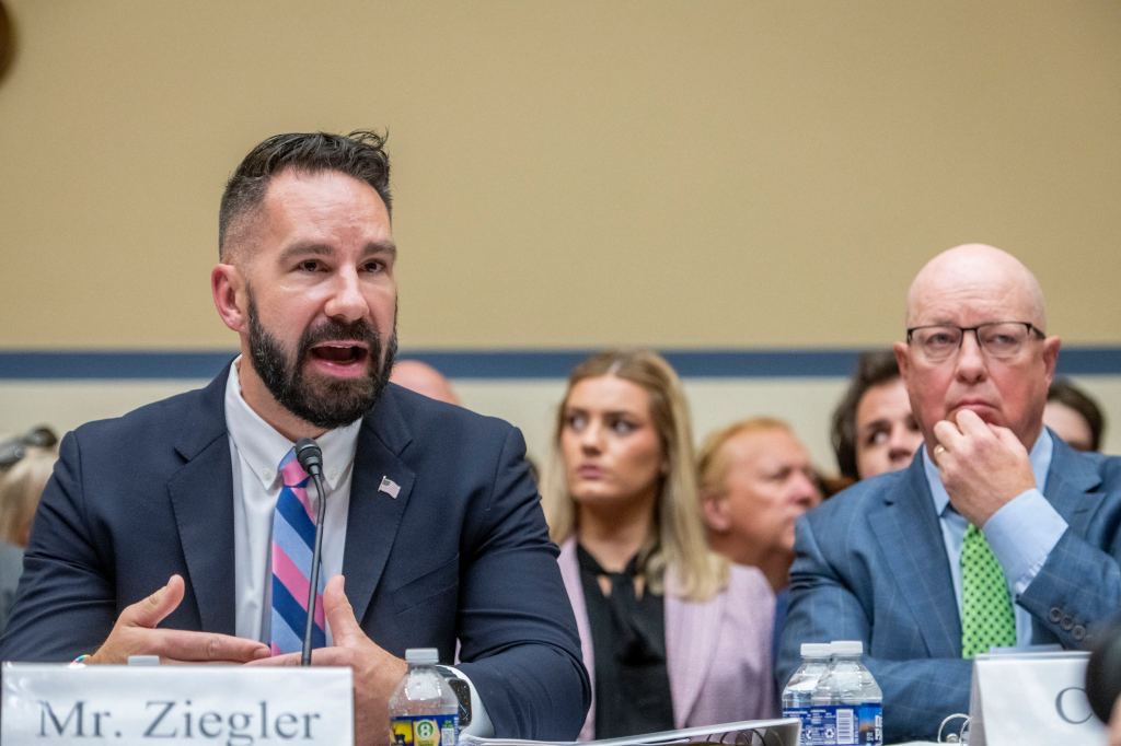 Internal Revenue Service Criminal Investigator Joseph Ziegler, left, is joined by his counsel, right, as he responds to questions during a House Committee on Oversight and Accountability hearing.
