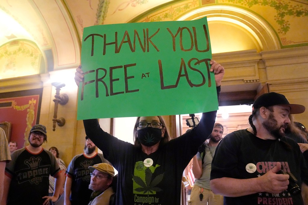 A woman celebrating marijuana being legalized in Minnesota in St. Paul on May 30, 2023.