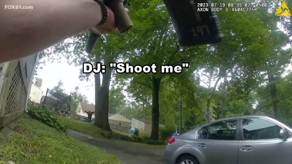 dramatic arrest footage shows D.J. begging police to shoot him.