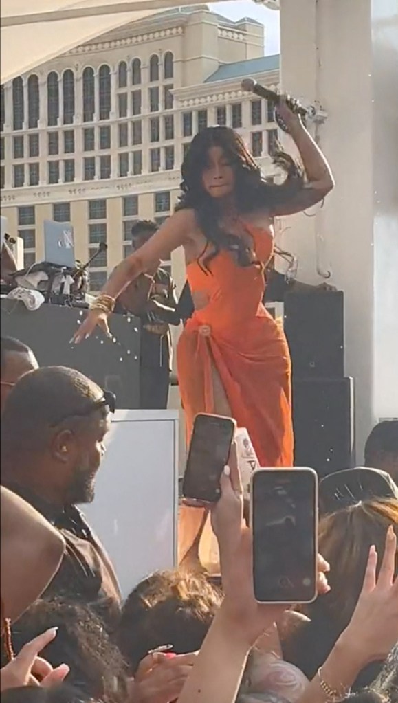 This is the moment Cardi B throws a microphone at an audience member who hurled a drink at her.