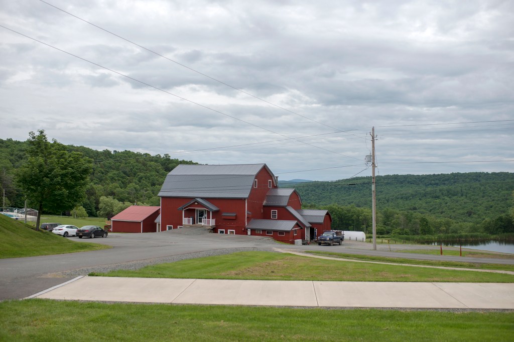 A red barn stands near where the Family Foundation School used to operate, in Hancock, NY. “We were a long way from home. I didn’t like this at all,” writes Ianelli of the day she arrived there. 