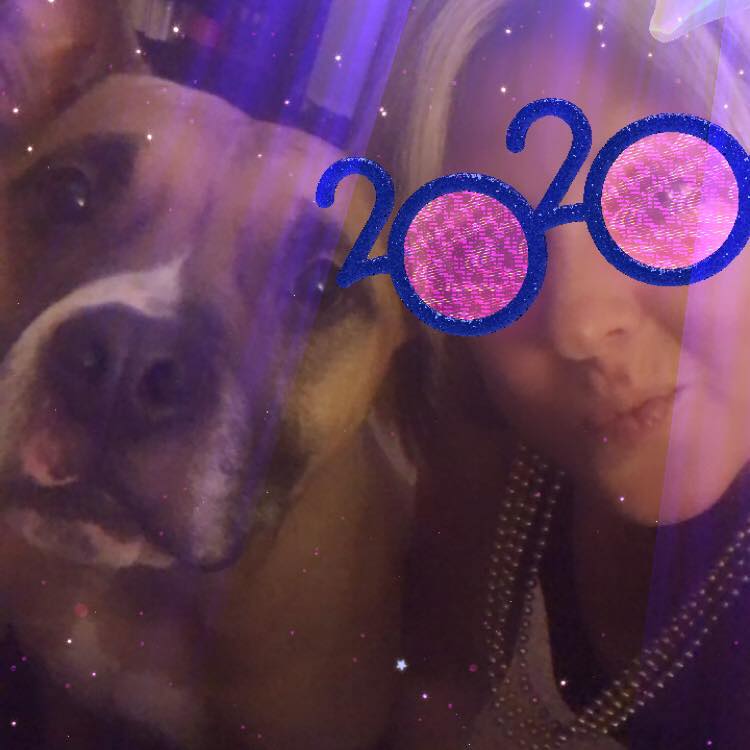 Kimberly Hoffman , wearing 2020 glasses, and her dog