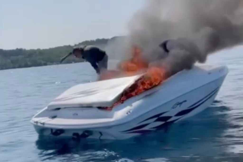 Men jump off burning boat