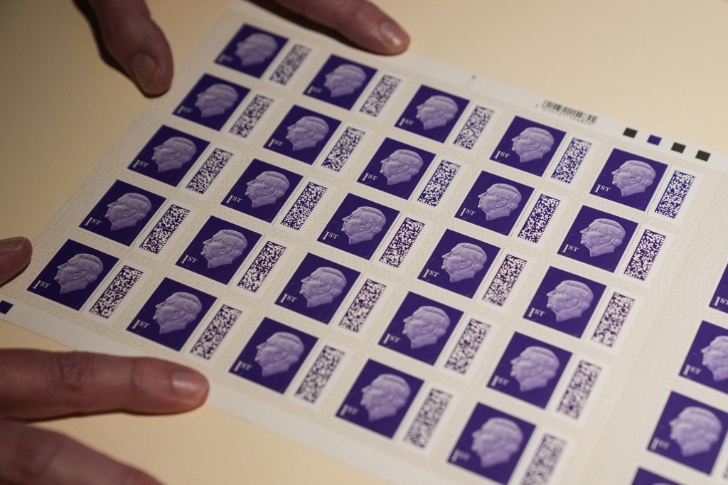 A photo of purple-colored stamps. 