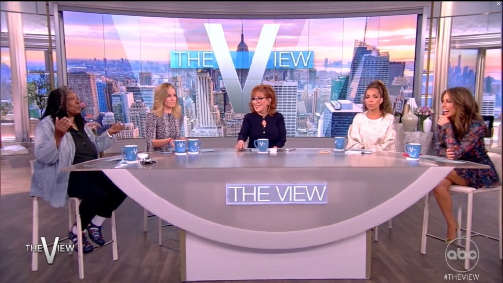 The cast of "The View" — Whoopi Goldberg, Joy Behar, Sunny Hostin, Alyssa Farah Griffin and Sara Haines sitting around the table. 