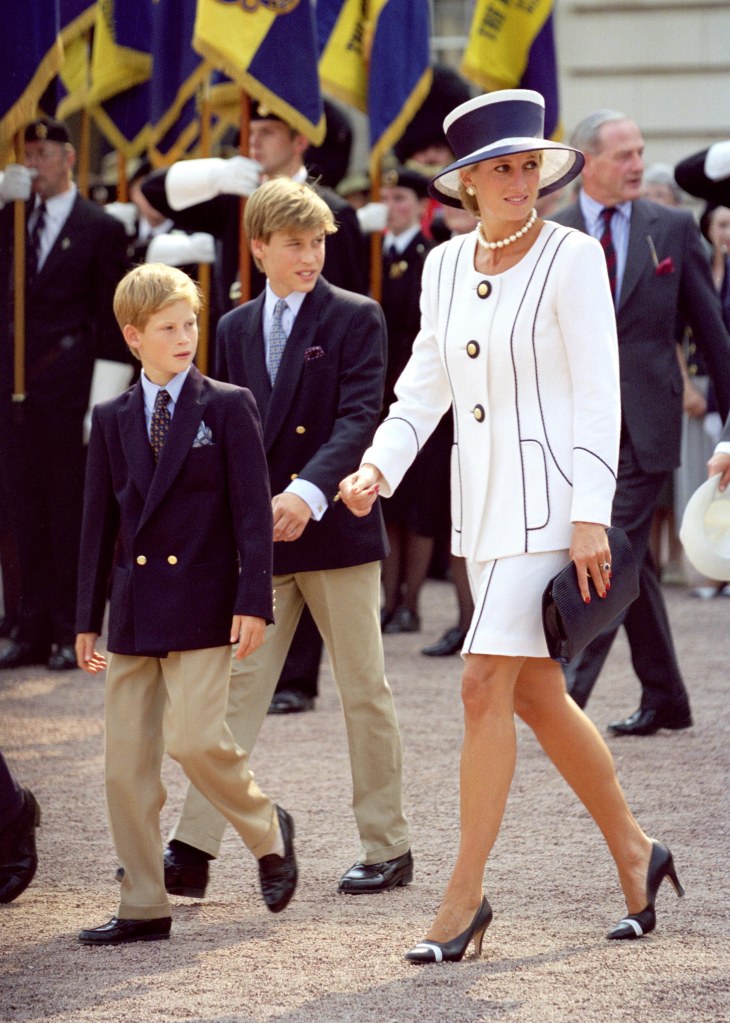 Princess Diana walks with her sons, William and Harry in 1995.