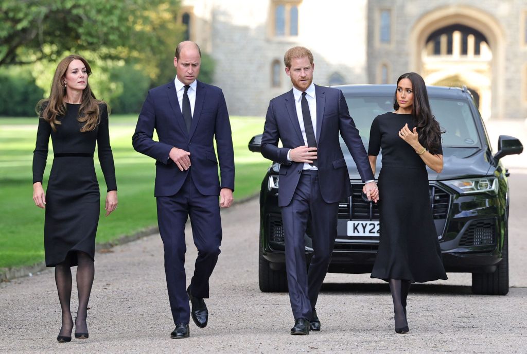 Picture of Meghan Markle and Prince Harry walking alongside Prince William and Princess Kate Middleton. 