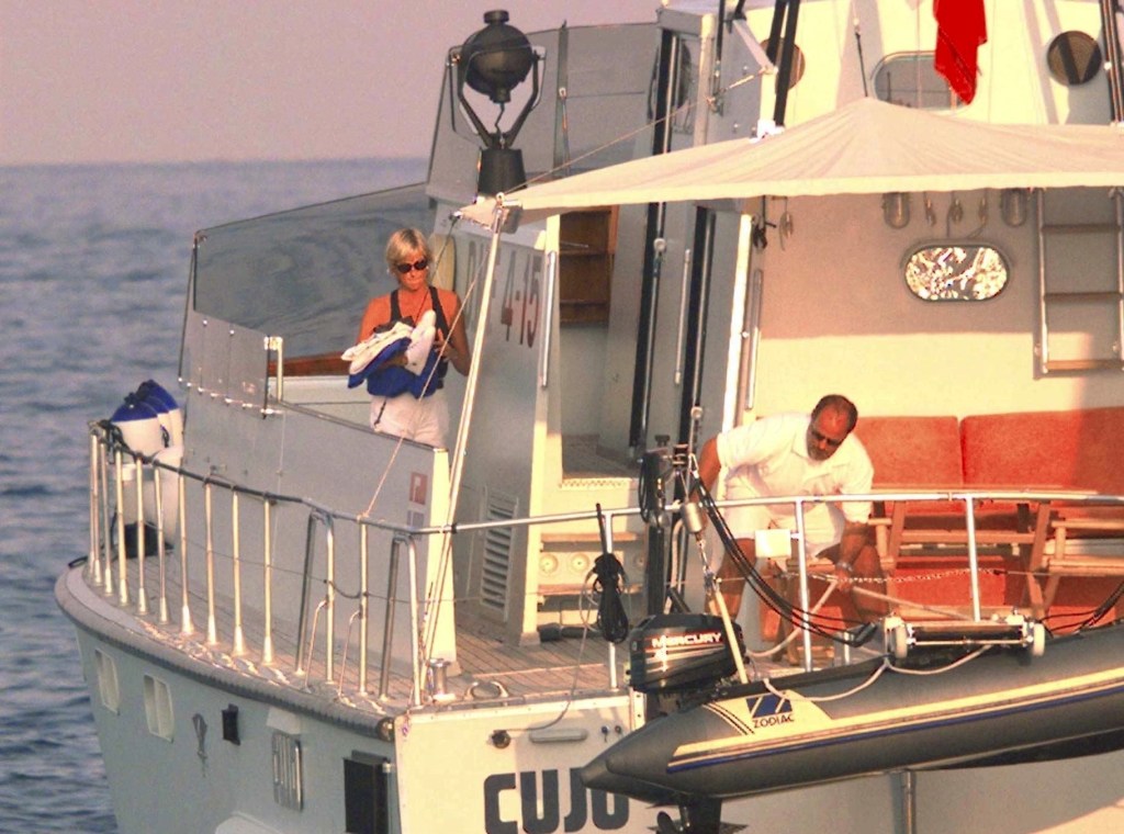 Princess Diana and Dodi aboard a small yacht. 