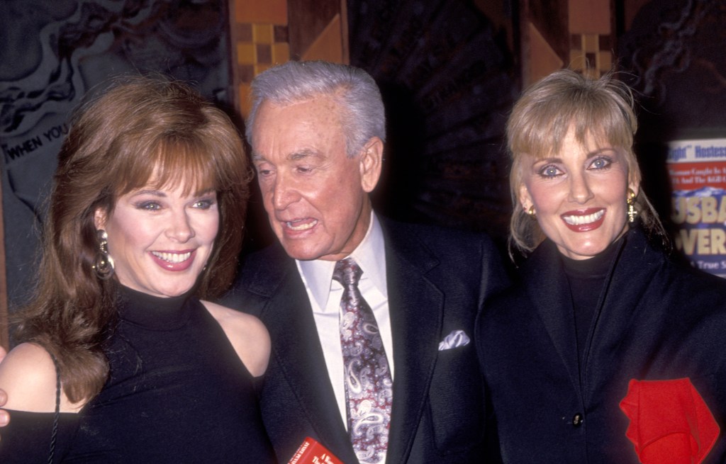 Holly Hallstrom, Bob Barker and Janice Pennington attend the party to celebrate Pennington's book "Husband, Lover, Spy" on January 13, 1994.