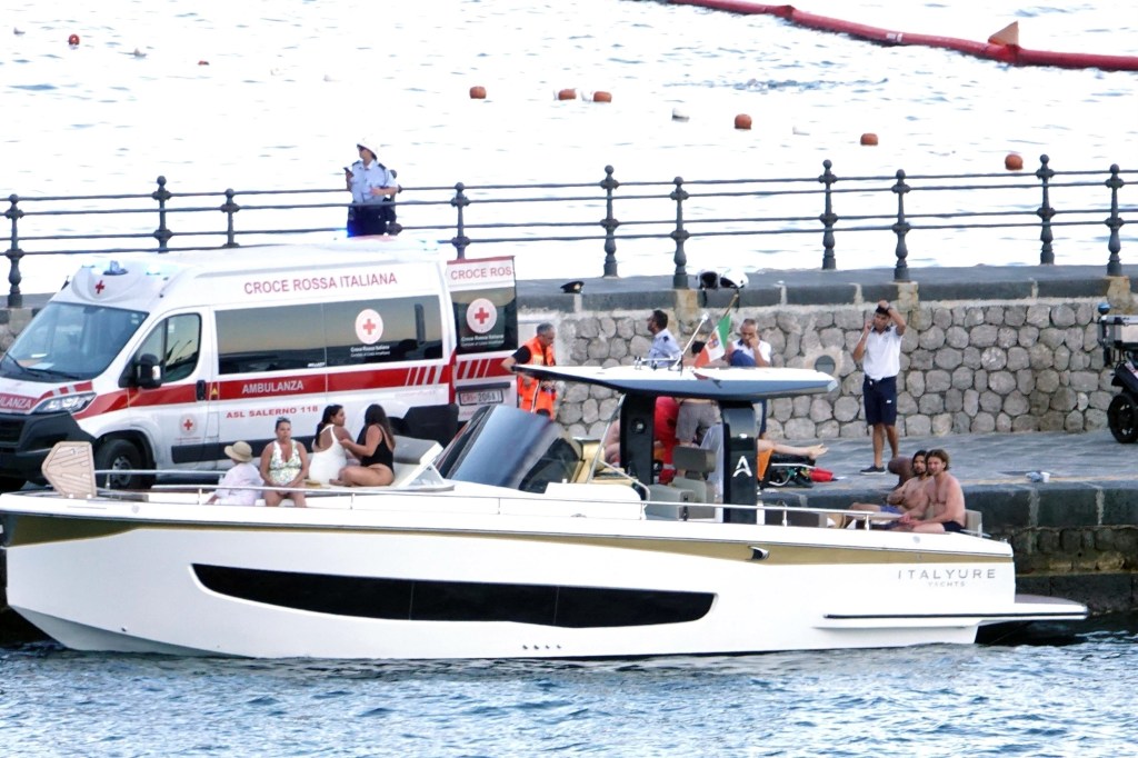 An ambulance is seen on a pier in Amalfi after Thursday's accident 