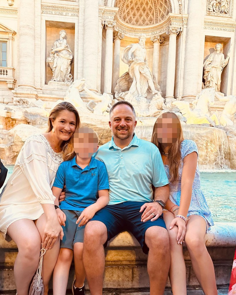 Adrienne Vaughan, husband Mike White and their children at the Trevi Fountain in Rome 