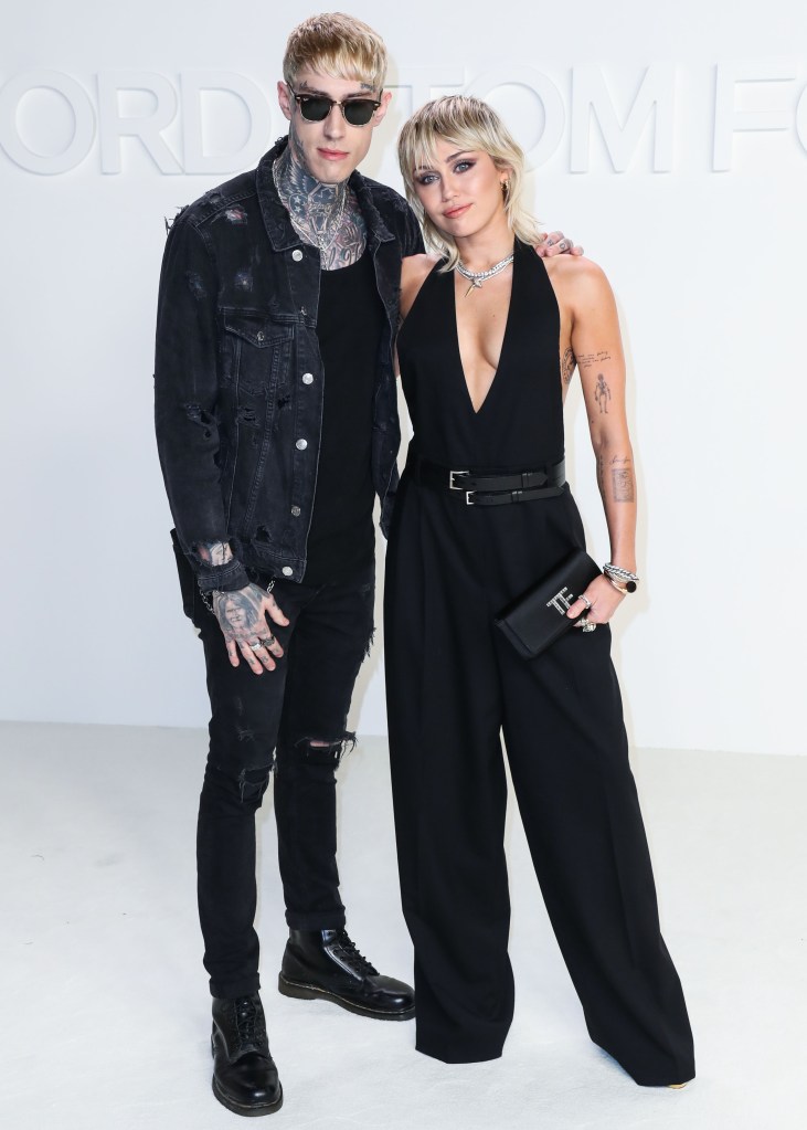 Trace and Miley Cyrus attend the Tom Ford: Autumn/Winter 2020 Fashion Show.