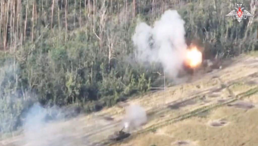 pictured is the Russian shellings of a Ukrainian tank Sunday. 