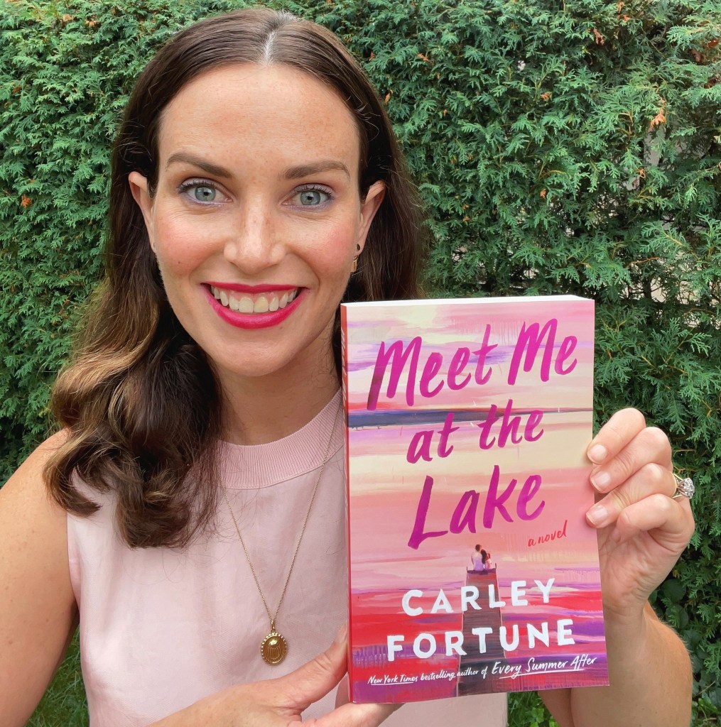 Photo of Carley Fortune with her book. 