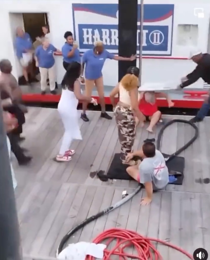Man hits woman with folding chair. 