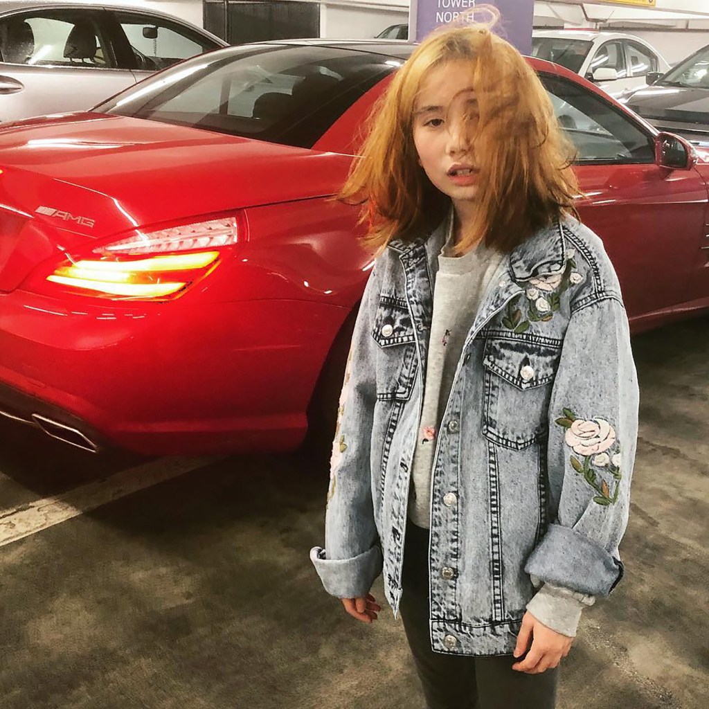 Lil Tay rose to digital fame at age 9 in 2017 by sharing spoof clips of herself holding wads of cash to her ear.