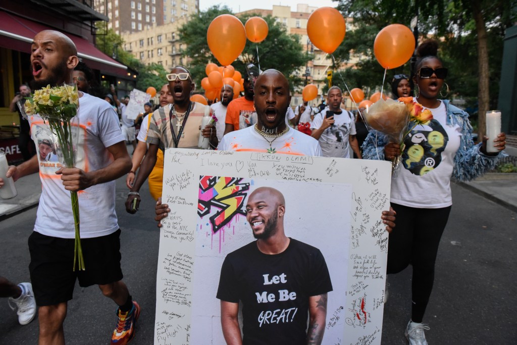 People participate in a memorial march for O'Shae Sibley on August 5, 2023 in New York City.