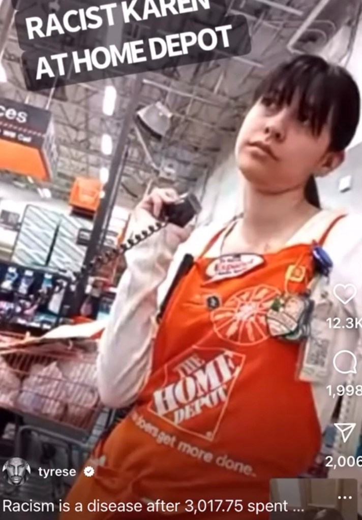Photo of a person working at Home Depot. 