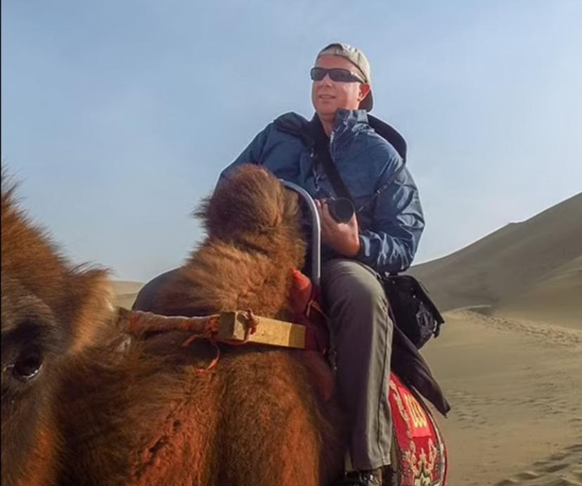 Simon Patterson on a camel