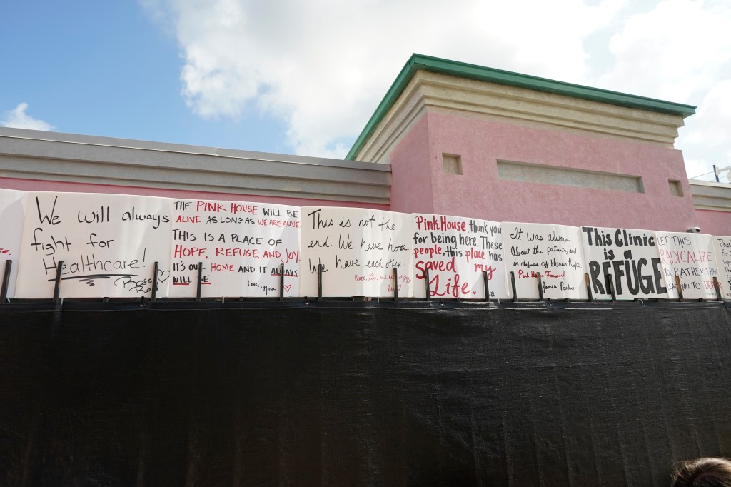 Abortion rights advocates posted supportive signs on the privacy fencing outside the Jackson Women's Health Organization last year. 