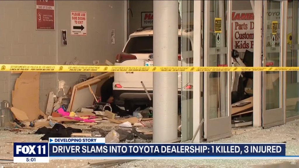 Screenshot Fox 11 of car dealership destroyed. 