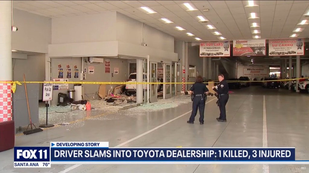 Two male car dealership employees were treated for non-life-threatening injuries. 