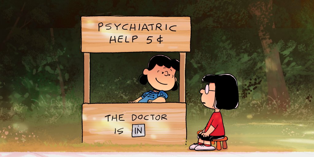 Marcie sitting at Lucy's psychiatric booth. 