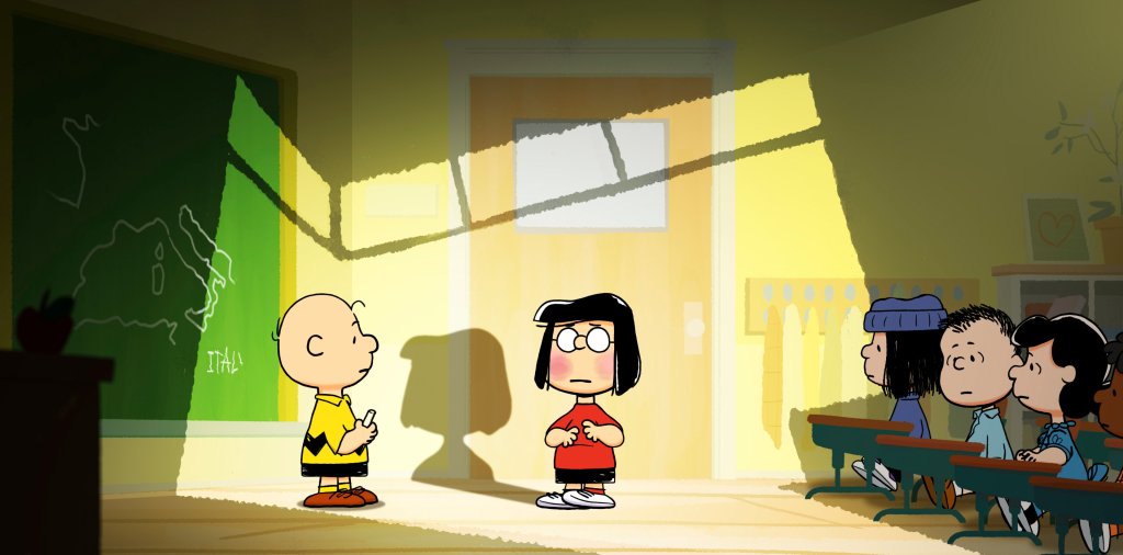 Charlie Brown and Marcie in a classroom. 