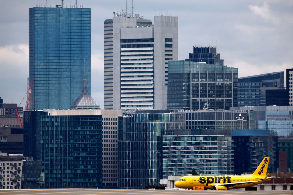 The air traffic control altered the American Airlines flight to stop because a Spirit Airlines plane was too close to the runway. 