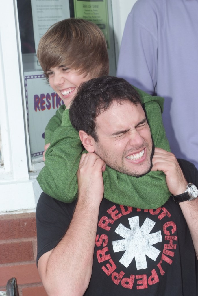 Justin Bieber musician and Scooter Braun pose for a portrait on the set of the music video One Less Lonely Girl in Watertown, Tennessee on September 12, 2009