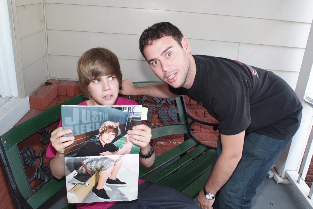 Justin Bieber musician and Scooter Braun pose for a portrait on the set of the music video One Less Lonely Girl in Watertown, Tennessee on September 12, 2009.  