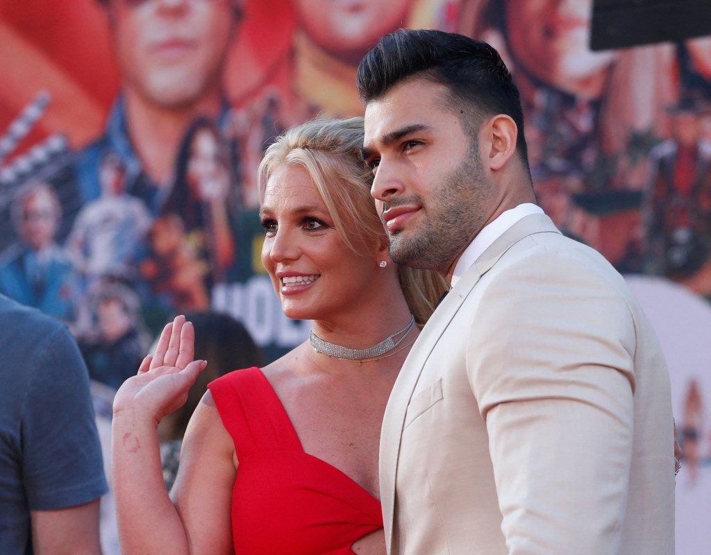 Britney Spears and Sam Asghari pose at the premiere of "Once Upon a Time In Hollywood" in LA.
