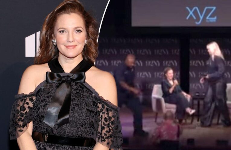 Drew Barrymore rushed off stage after man rushes star at event