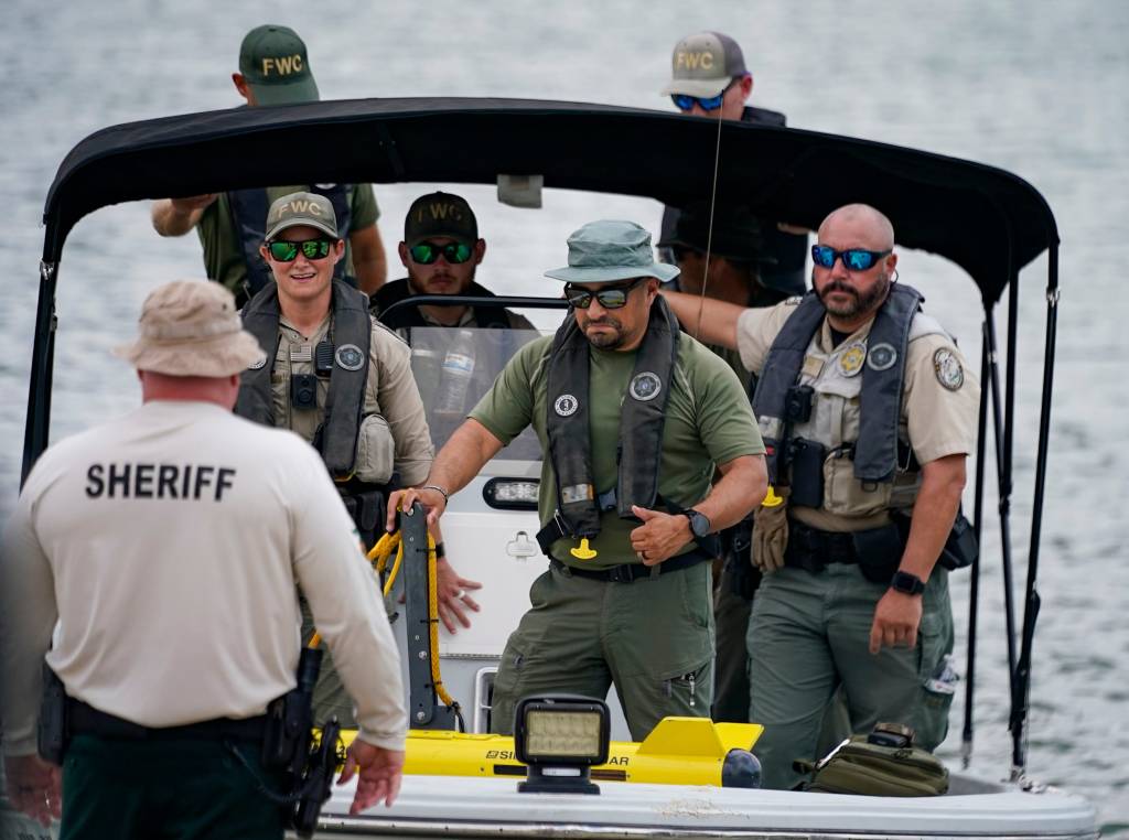 FWC officers return from searching for a missing Florida Gulf Coast University student using a side-scan sonar.
