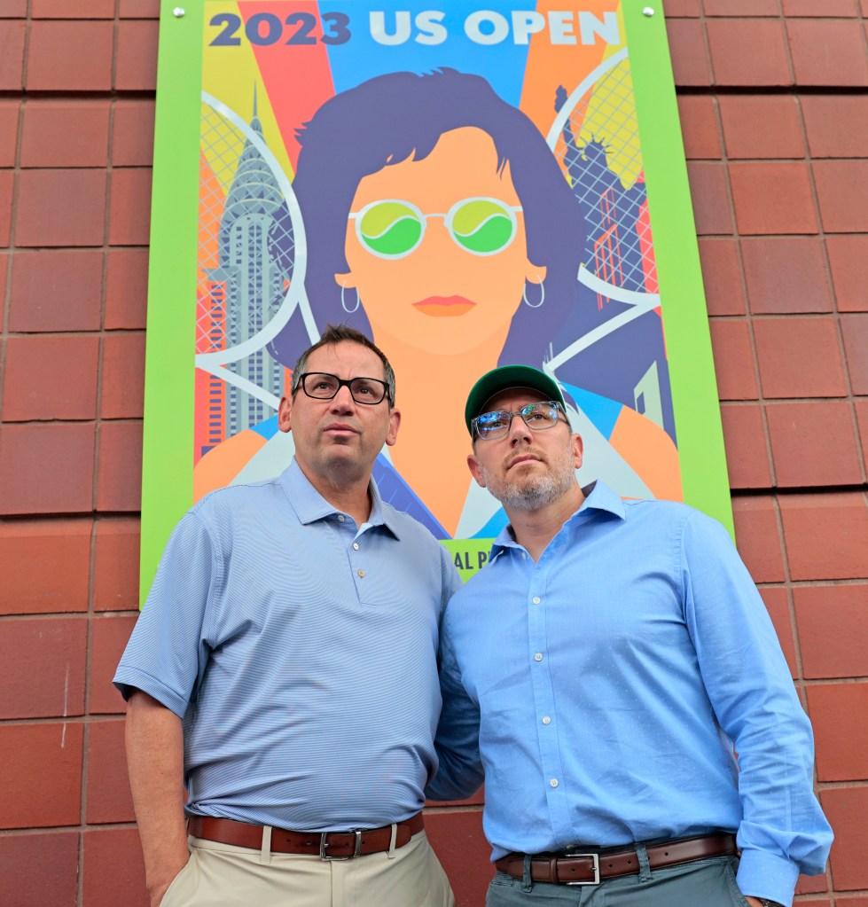 Gary Falkowitz (right) and Mitchell Hassenbein (left) pose for a photo outside Arthur Ashe Stadium, where their late sons were honored Monday. 