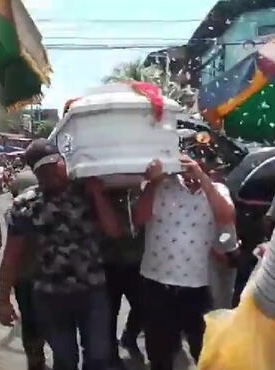 A still from Perea's funeral.