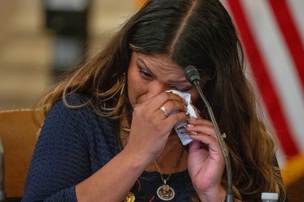 Coral Briseno, mother of Marine Corps Cpl. Humberto A. Sanchez, in tears during the roundtable event.