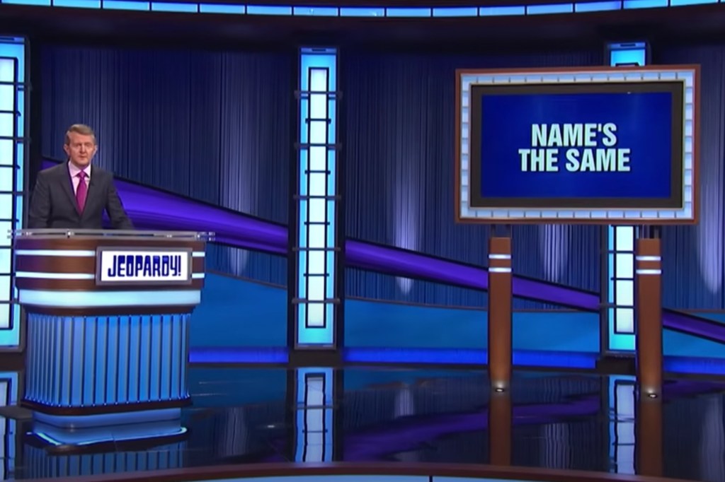 Photo of Mayim Bialik on the "Jeopardy!" stage. 