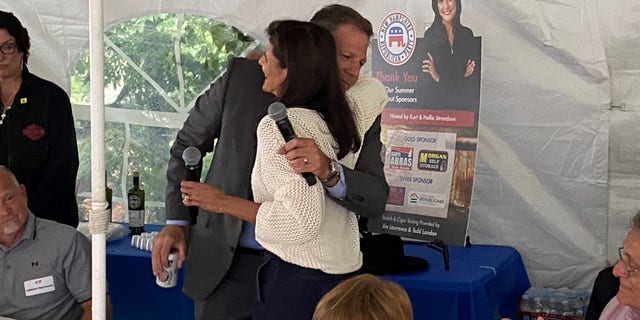 Chris Sununu hugs Nikki Haley in New Hampshire