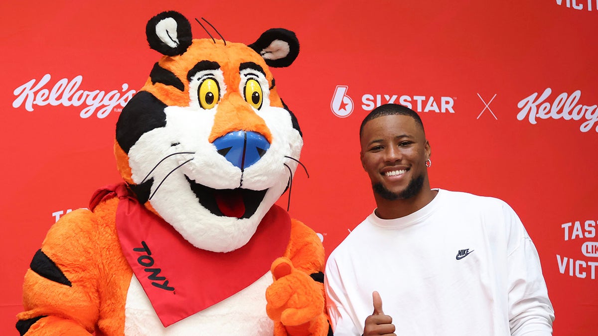 Saquon Barkley with Tony The Tiger