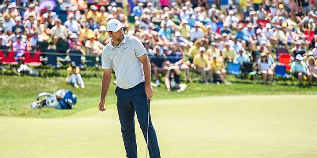 Scottie Scheffler reacts to missed putt