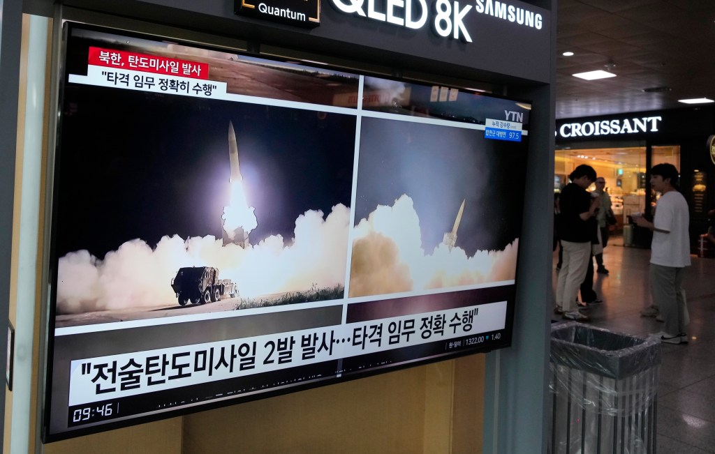 A TV screen shows images of North Korea's missile launch during a news program at the Seoul Railway Station in Seoul, South Korea, on Aug. 31, 2023. 