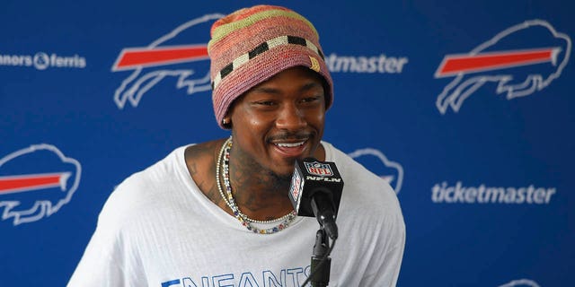 Stefon Diggs speaks to reporters after training camp