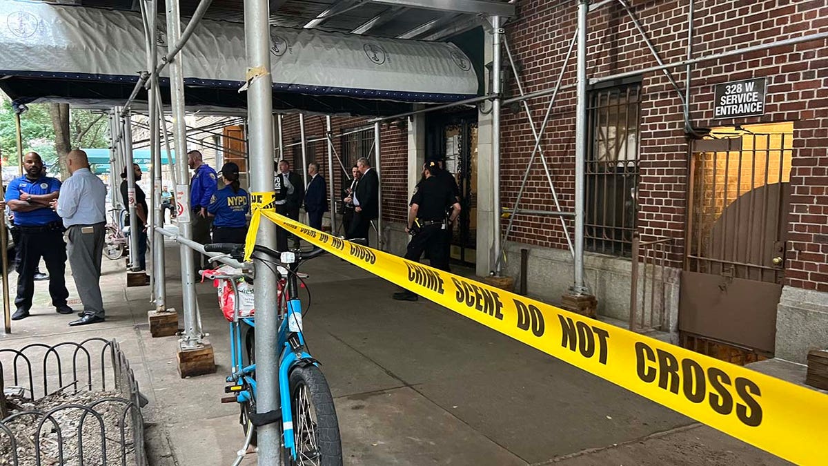 Investigators cordon off an apartment building in New York City’s Upper West Side