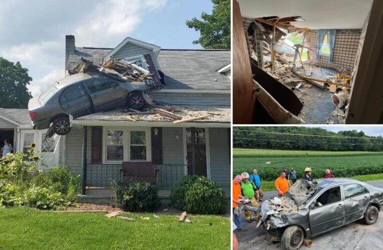Car crashes into second floor of Pennsylvania home, left dangling from roof in ‘intentional act’