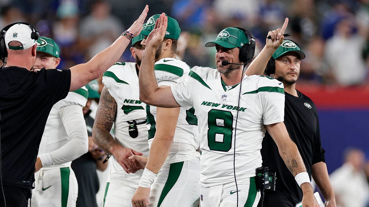 Aaron Rodgers celebrates a touchdown