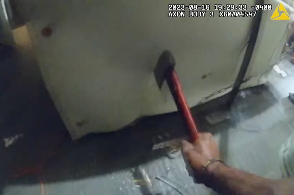 Police found hatchet in the mess of the home they used to break the chain. 