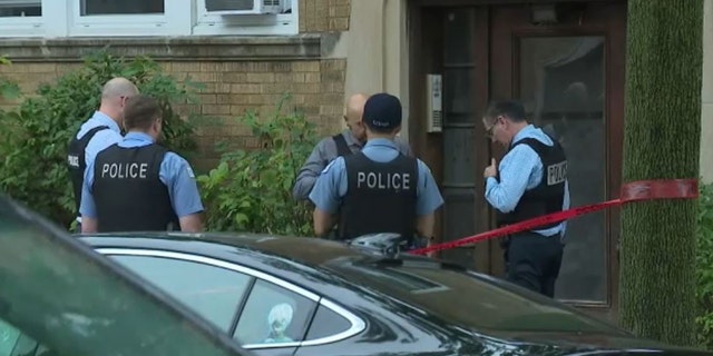 police outside apartment building