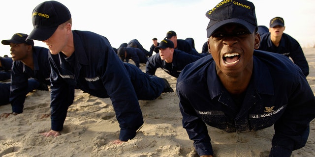 Coast Guard recruits training on beach