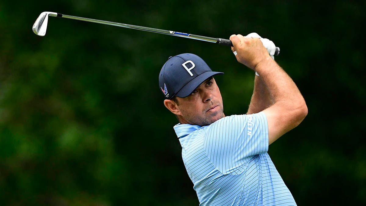 Gary Woodland tees off